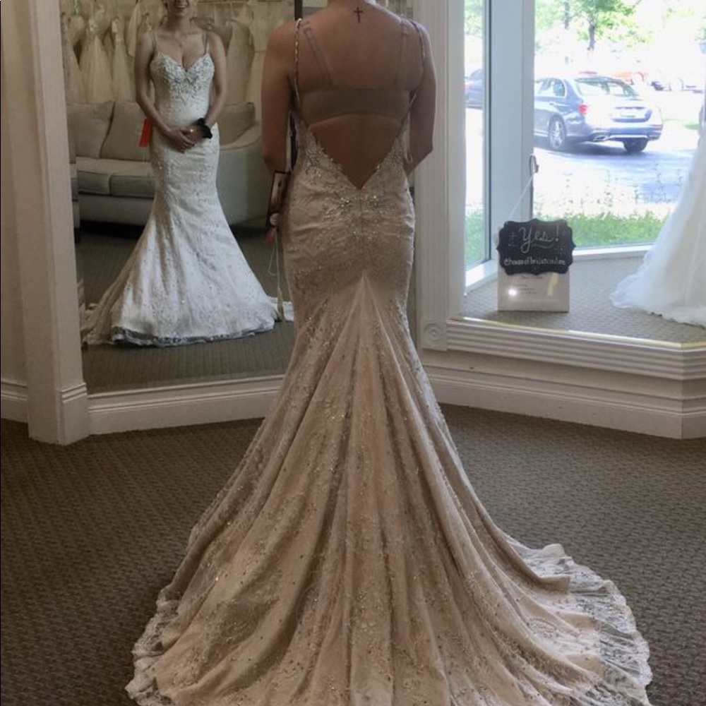 Wedding dress never been used only tried on once!